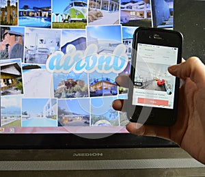 Airbnb app and laptop