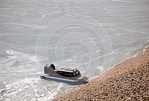 Airboat on the ice of the reservoir.