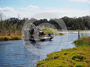 Airboat Navigating Channel in Southern Florida