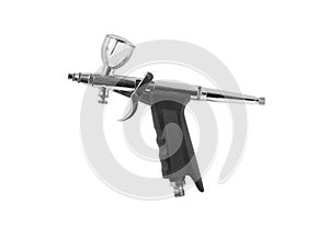 Airbrush gun on white background