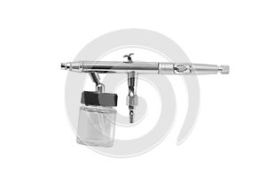 Airbrush gun on white background