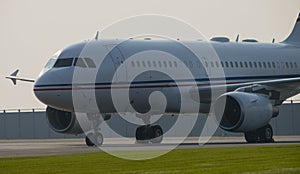 Airbus A-319 on the platform in the early morning