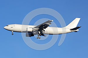 Airbus A300 civil cargo airplane landing in airport