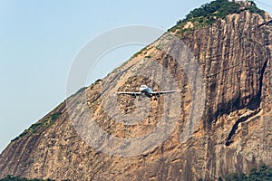 Airbus A319-132 airplane of the company Latam in front of the Sugarloaf Mountain