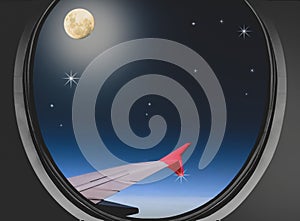 Airbus a380 airplane window view in a fullmoon night (illustration)