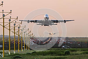 Airbus A380 taking off at dawn.