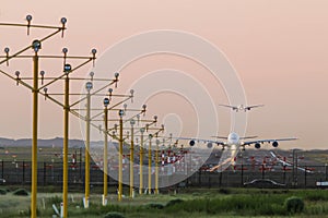 Airbus A380 taking off at dawn.