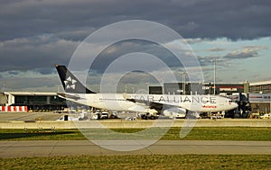 An Airbus A330 airplane from the Colombian airline Avianca (AV) with a Star Alliance livery