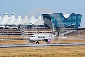 Airbus A320 operated by Volaris taxiing at Denver International Airport, Colorado