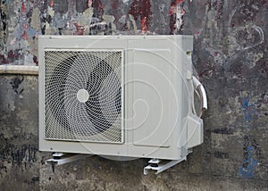 Airconditioner on the wall of the house. photo
