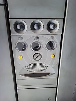 Aircraft ac vent with assistance button and light sounds from low angle