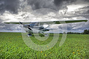 Aircraft against thunderstorm clouds background