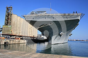 Aircraft carrier at port