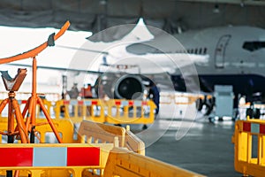 Aircraft engine maintenance in hangar, repairing