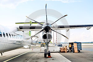 Aircraft engine propeller blades at the airport with clear sky