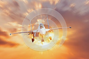 Aircraft fighter jets with the chassis released maneuvers against the background of bright light shine