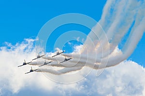 Aircraft fighter jets smoke the background of blue sky white clouds