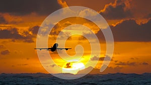 Aircraft flying over amazing tropical ocean at sunrise. Dominican Republic travel destinations.