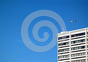 Aircraft flying over hotel