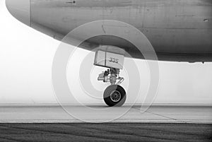 Aircraft on foggy runway