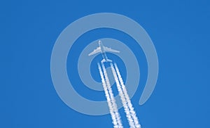 Aircraft at high altitude. Antonov cargo plane on a blue sky