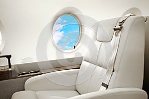 Aircraft (jet) business class interior with porthole