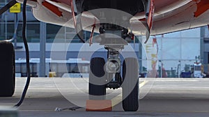 Aircraft landing gear at the parking lot.