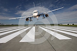 Aircraft low over the runway