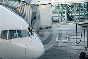 Aircraft with passage corridor/tunnel being prepared