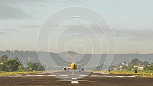 The aircraft is prepared for takeoff on the runway and takes off. Legazpi city. Philippines.