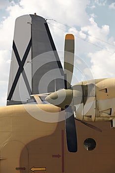 Aircraft propeller airframe and tail with blue sky background