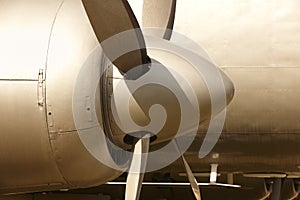 Aircraft propeller engines airframe and blades in warm tone