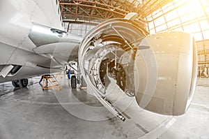 Aircraft service, view of the open engine hood.