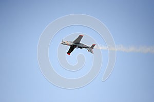 Aircraft tail smoke, up side down view