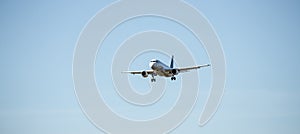 Airplane arrival at the airport. Travel by air, transportation photo
