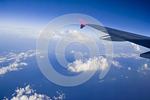 Aircraft wing on a blue sky