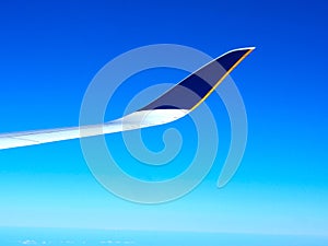 Aircraft wing on flight to travel in the atmosphere