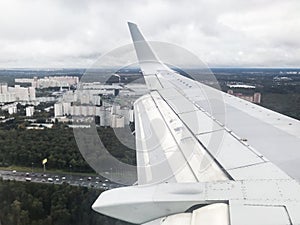 aircraft wing and Vnukovo district in Moscow