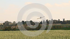 Aircraft. Yellow agriculture aircraft , crop duster with sound