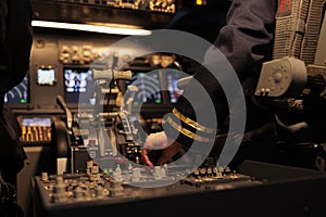 Aircrew member using control panel command on dashboard