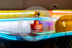 Airhockey table focused on a pod handle