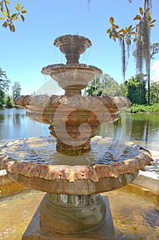 Airlie garden historic stone fountain closeup In Wilmington NC.