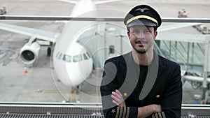 Airline Captain Pilot in Uniform Preparing for Flight at Airport Treminal Gate