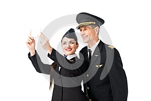 Airline captain and stewardess taking selfie