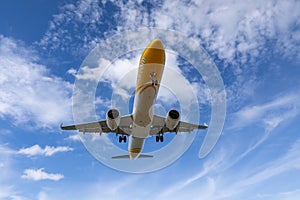 airline landing at airport with deep blue sky background