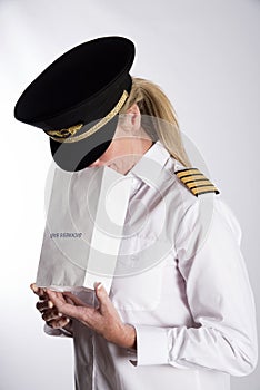 Airline officer using an air sickness bag