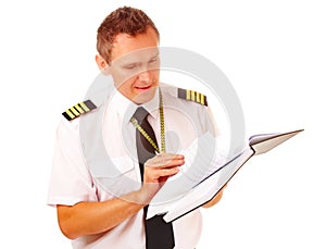 Airline pilot filling in papers