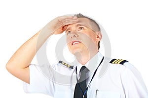 Airline pilot looking upwards