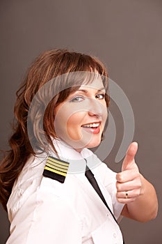 Airline pilot thumb up