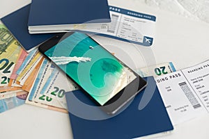 Airline tickets and documents on white background